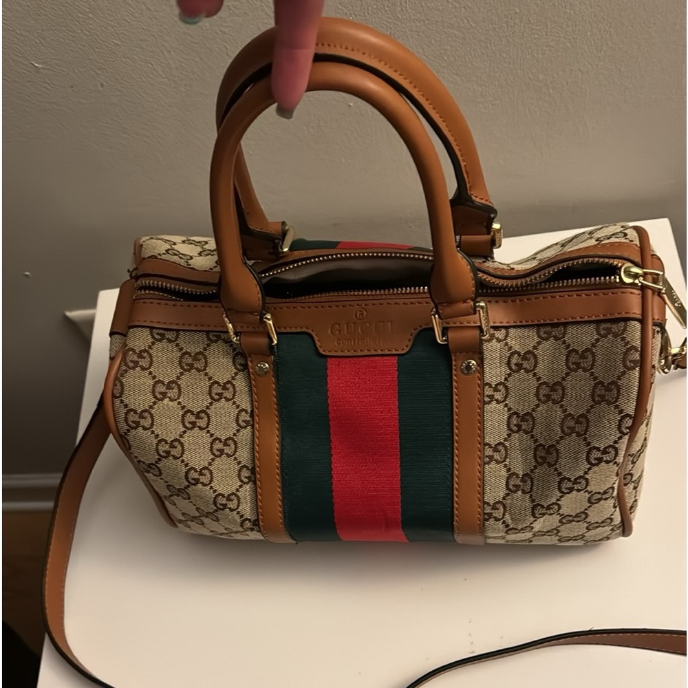 Gucci small top handle bag with crossbody strap. Duster bag &authentication card